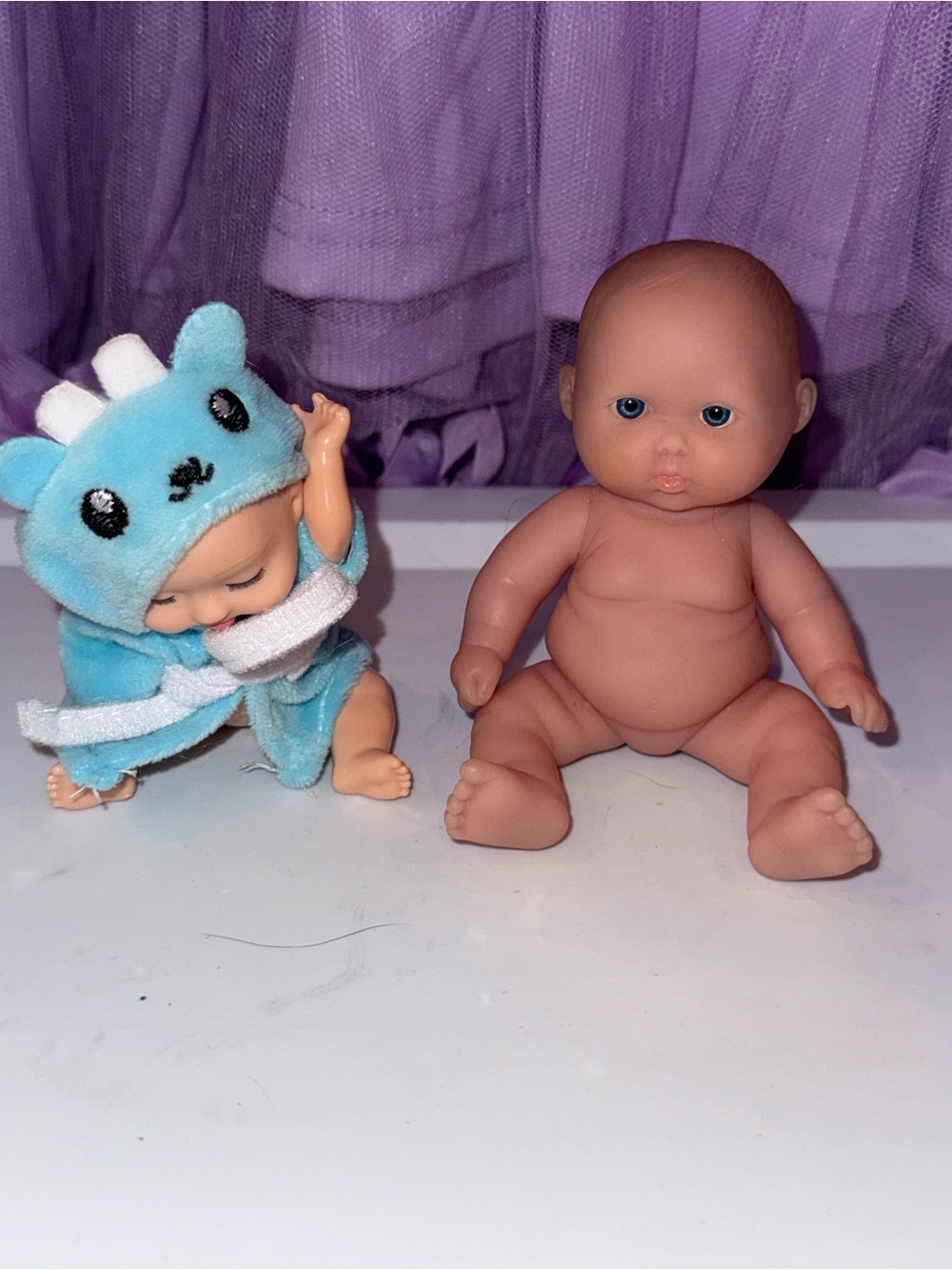 Berenguer baby doll and baby doll in robe